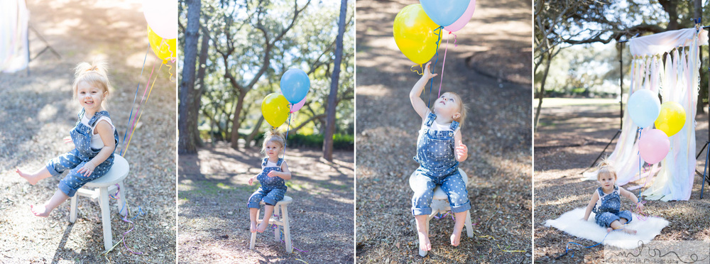 Little girls turning 2 with balloons