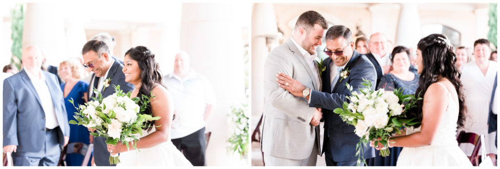 father walking bride up the aisle on wedding day. father of bride shakes grooms hand before giving daughter away