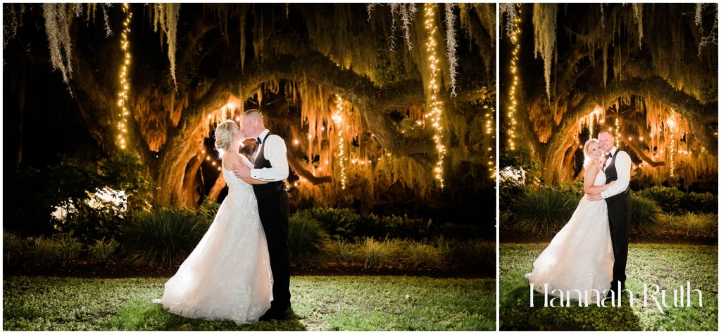 Bride and groom under the twinkle lights at the end of the night