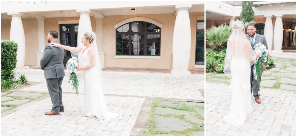 First look in courtyard on wedding day