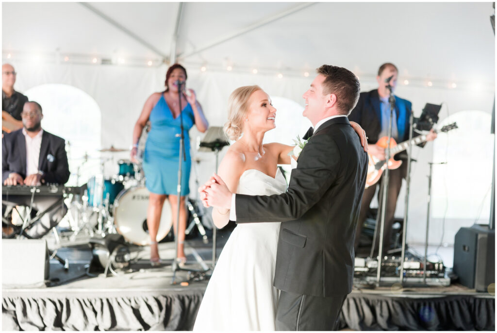 First Dance under white tent with band.