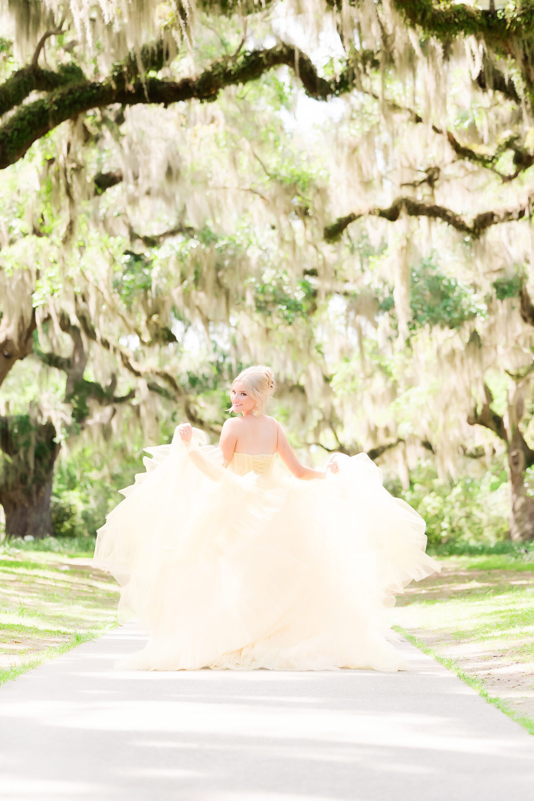 Beautiful bride in colorful dress at Brookgreen Gardens, South Carolina