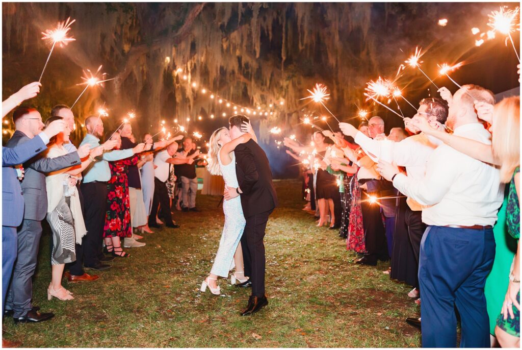 Sparkler Exit on wedding day with a kiss. 