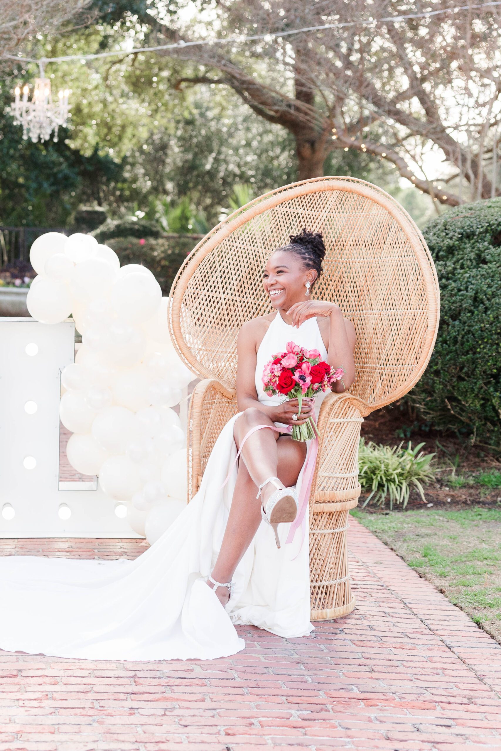Bride sitting on chair at Pinelakes Wedding Venue