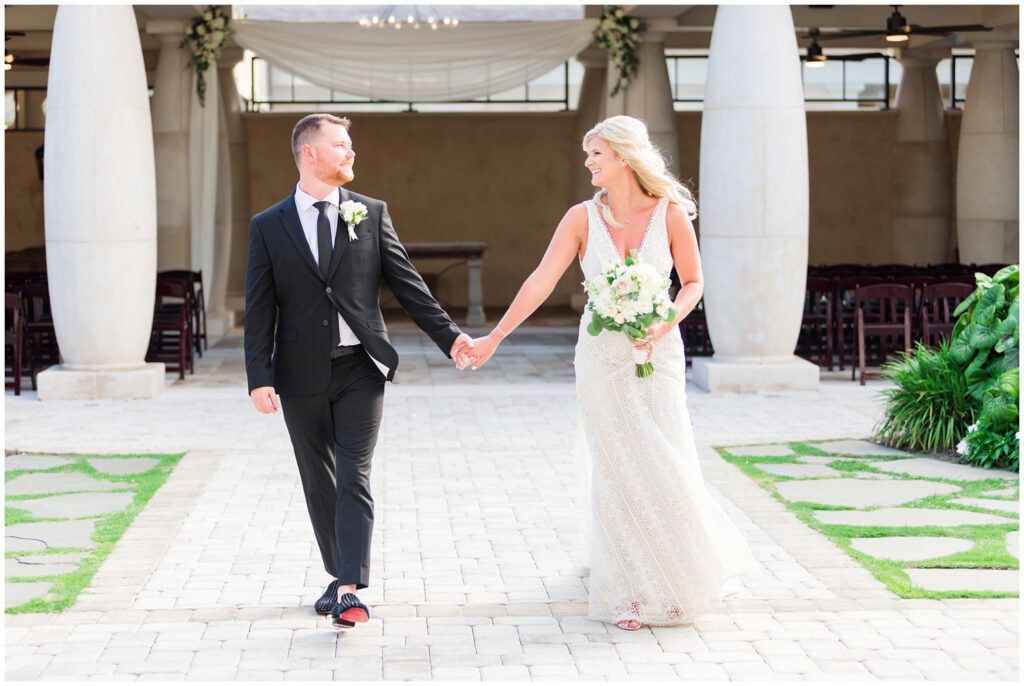 walking couple for their wedding day at Summer Wedding at 21 Main Events