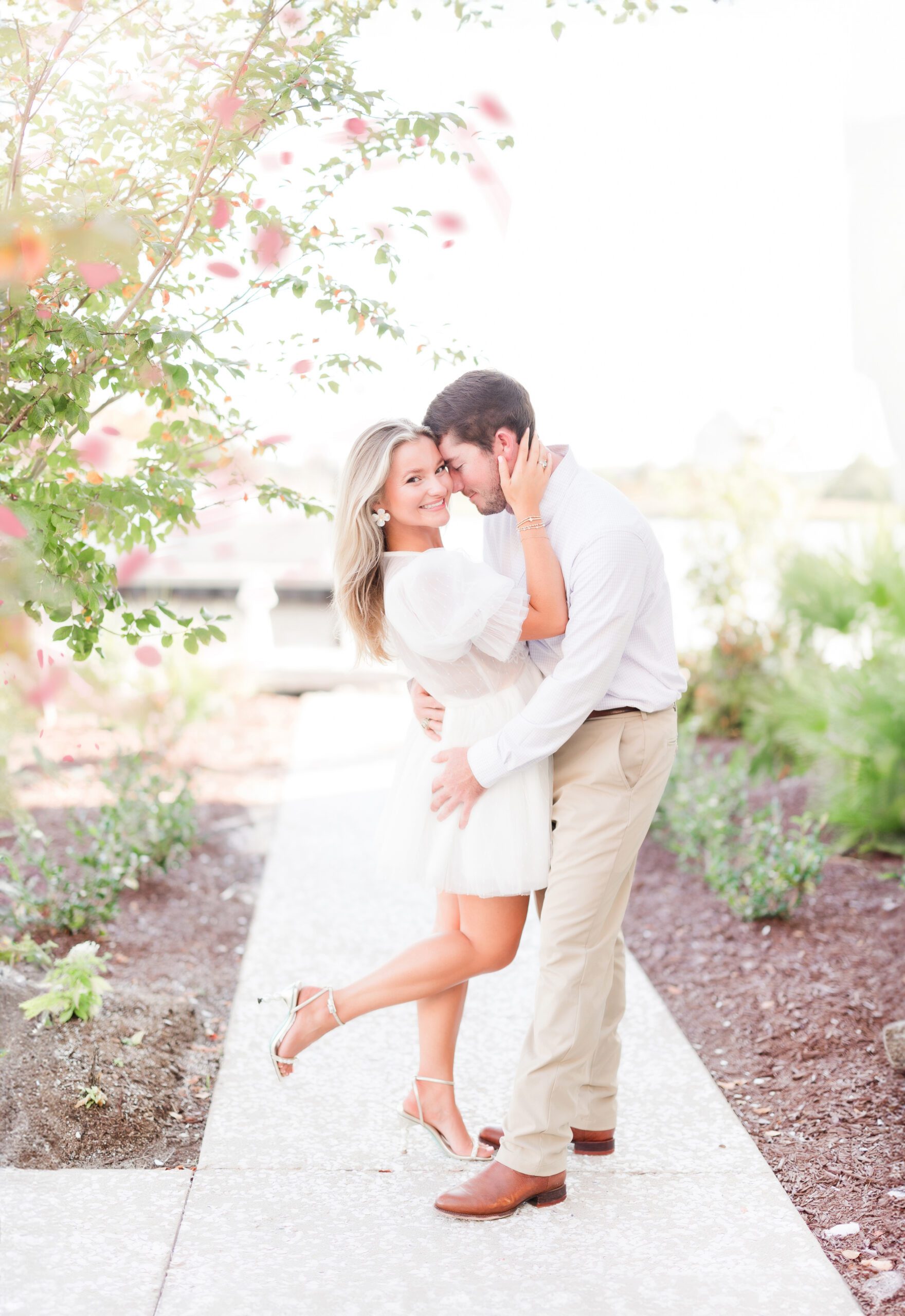 Couple kissing for engagement photos