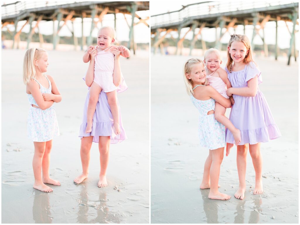 sisters posing for photos on the beach