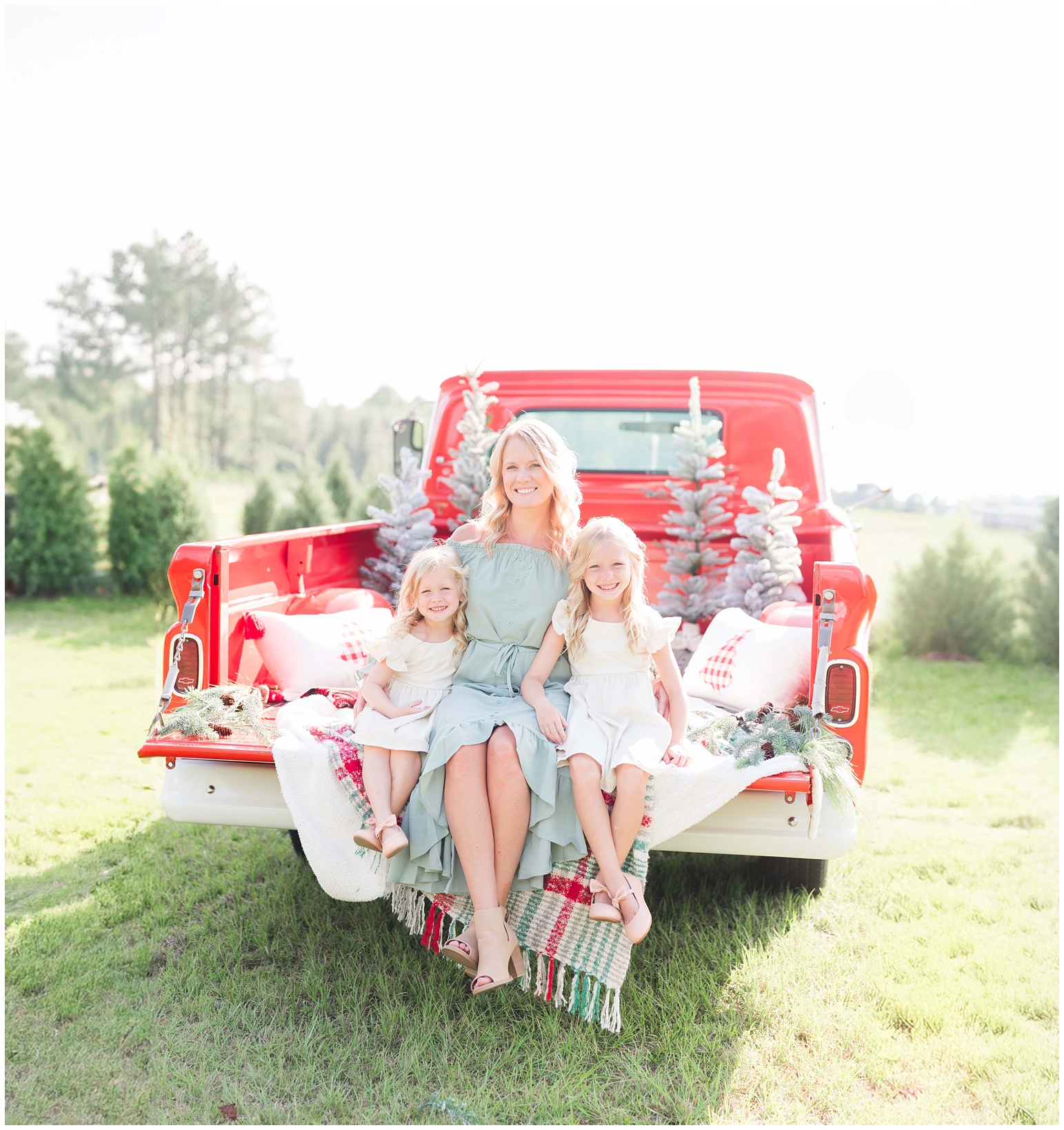 Red truck holiday mini sessions with mom and daughters