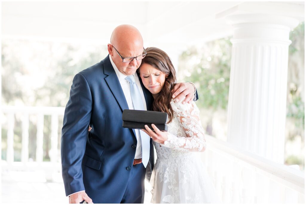 father gives daughter gift on her wedding day - Wedding at Heritage Club in Pawleys Island