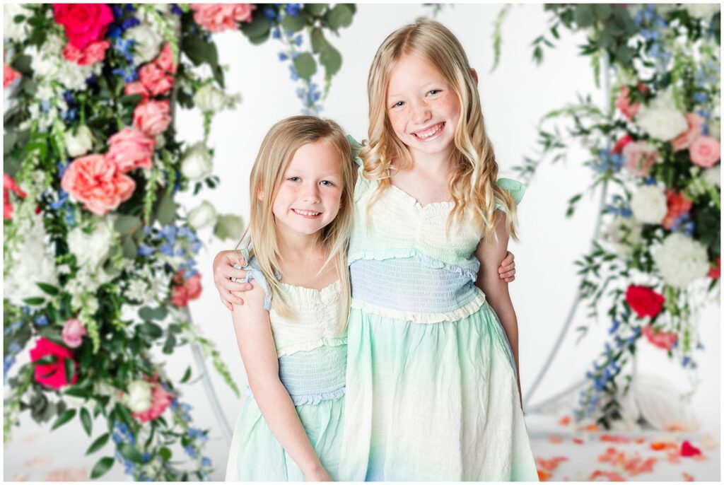 Girls posing with Florals for Spring photos