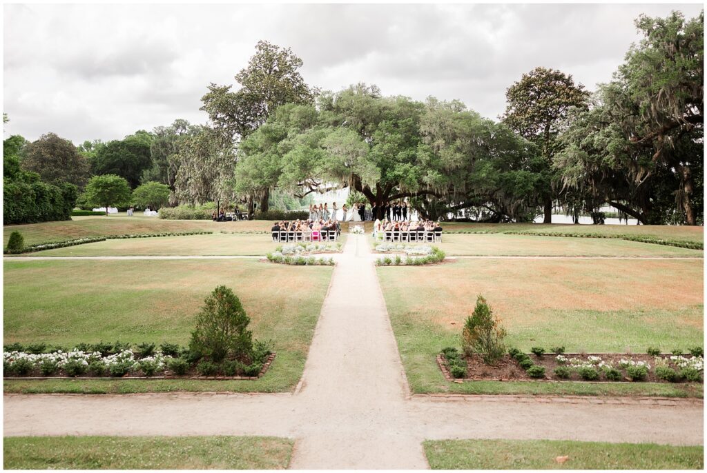 Bride and groom during their romantic garden ceremony at Middleton Place wedding in Charleston