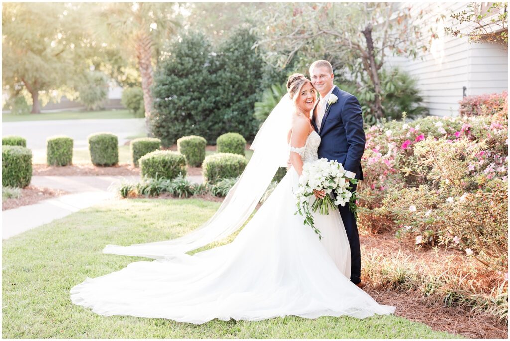 The Village House at Litchfield Wedding Bride and groom posing in front